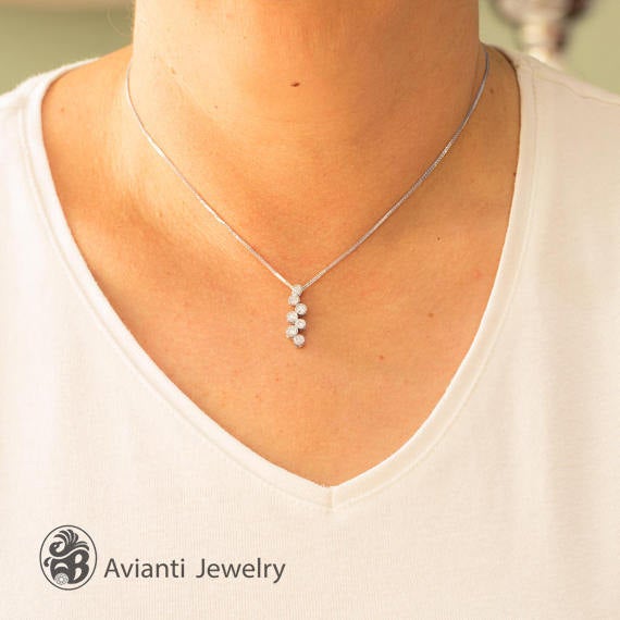 7 diamond journey necklace