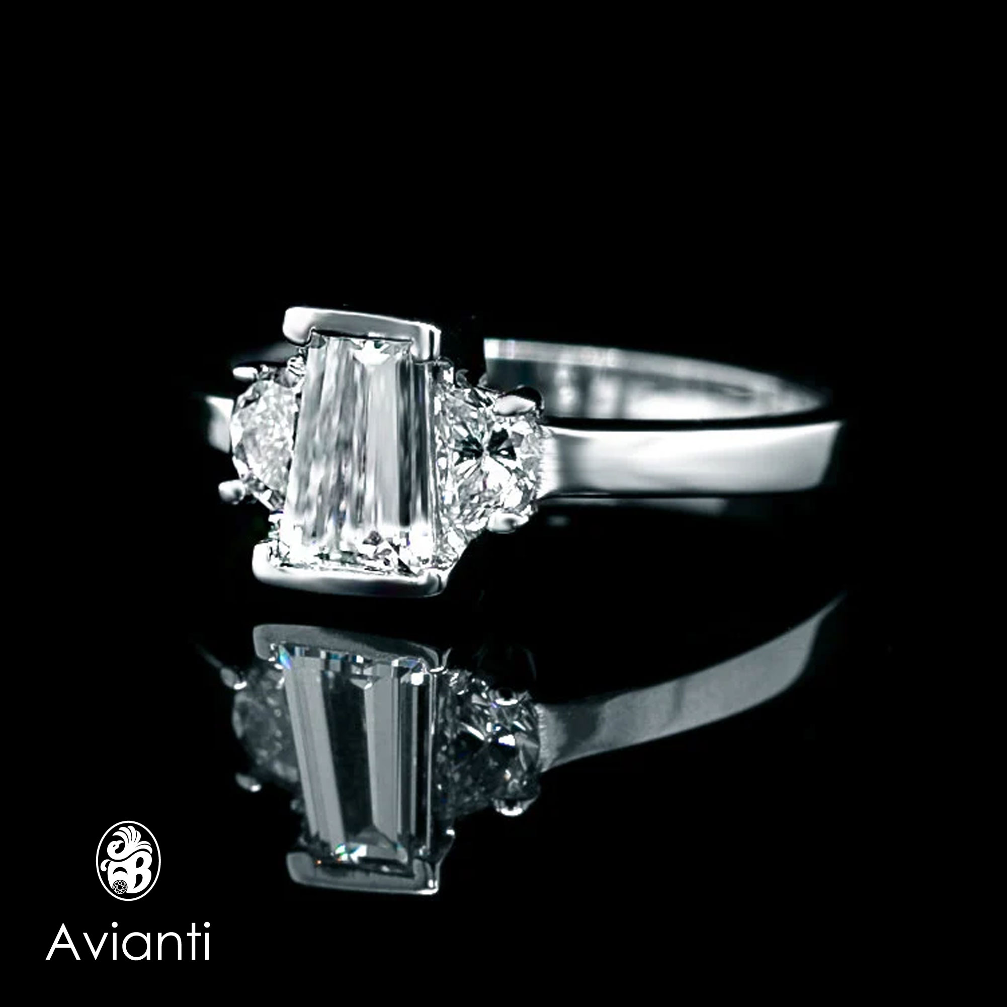 Three Stone Ring With Two Moon Shaped Stones